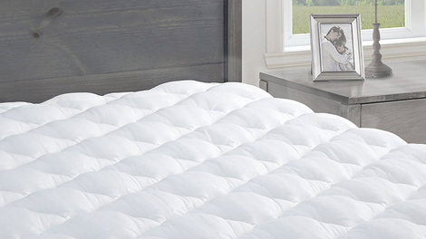 Pressure Relief Mattress Pad with Fitted Skirt | $64 - $83 | Amazon